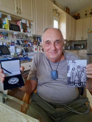 Holocaust Survivor With Medal 4